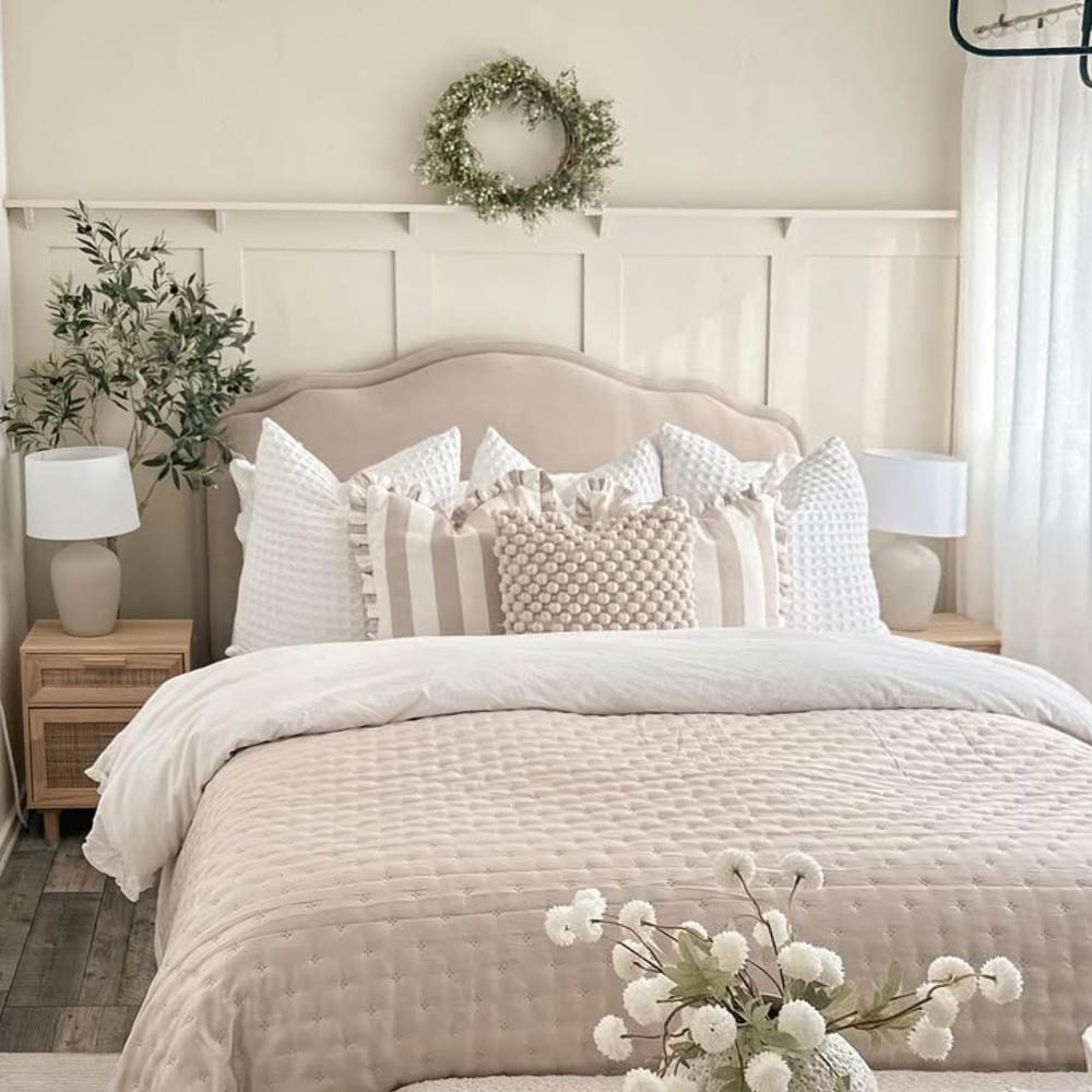 Light Bedroom showing bed in front of a shaker panelling kit
