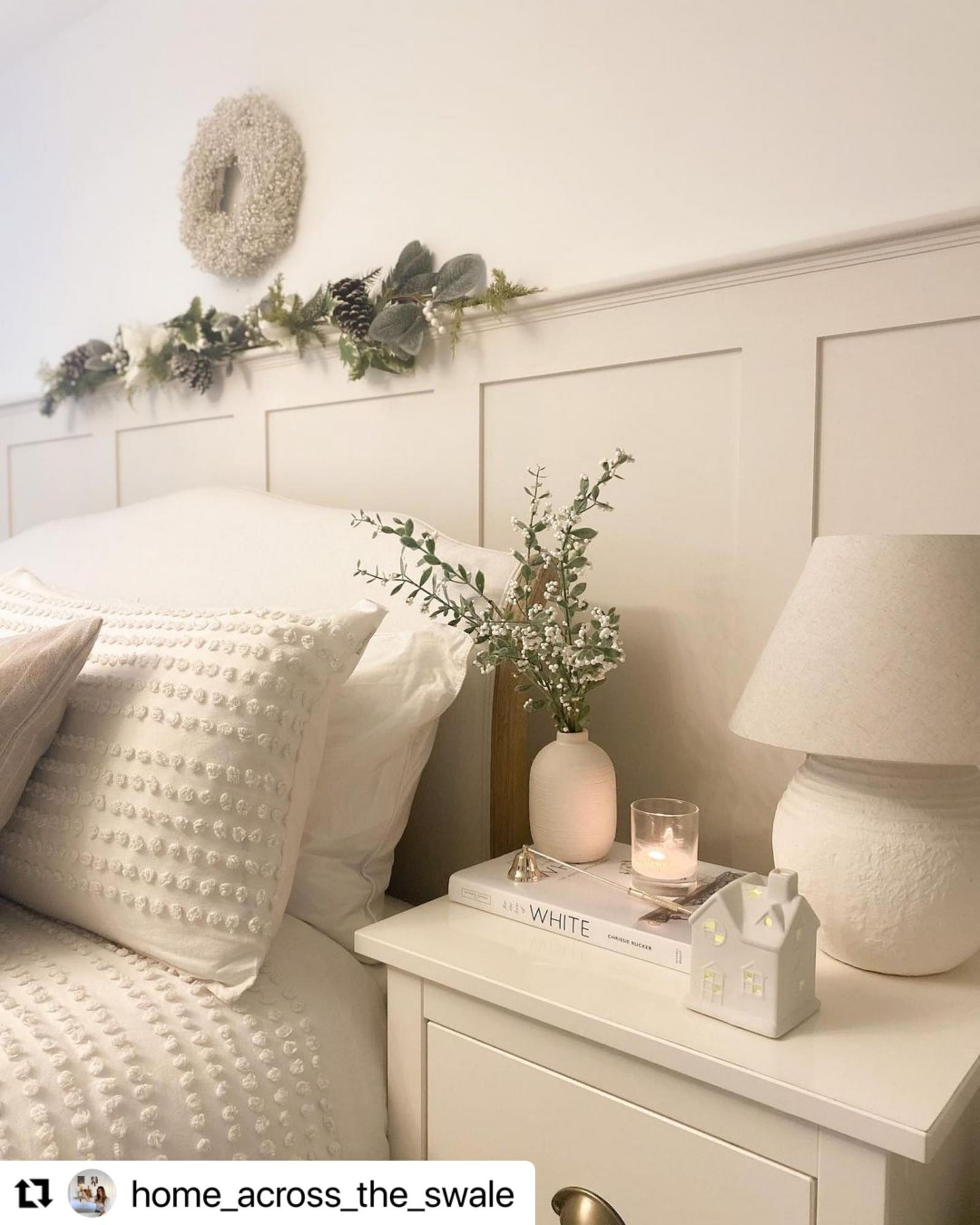 Half-height wall panelling with a dado rail in a bedroom