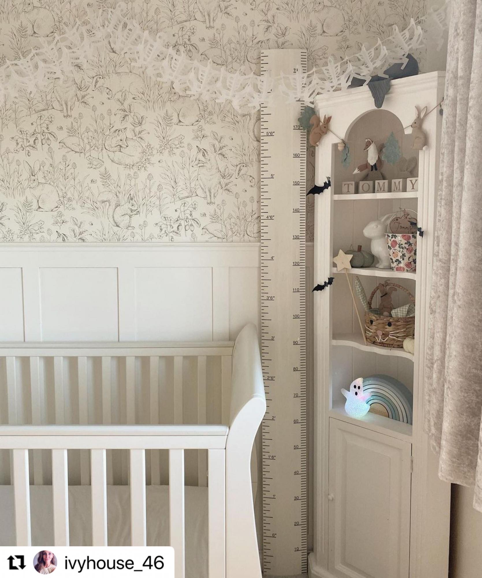 Custom shaker wall panelling with a dado rail in a nursery