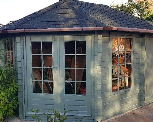 Blue shed with clear windows