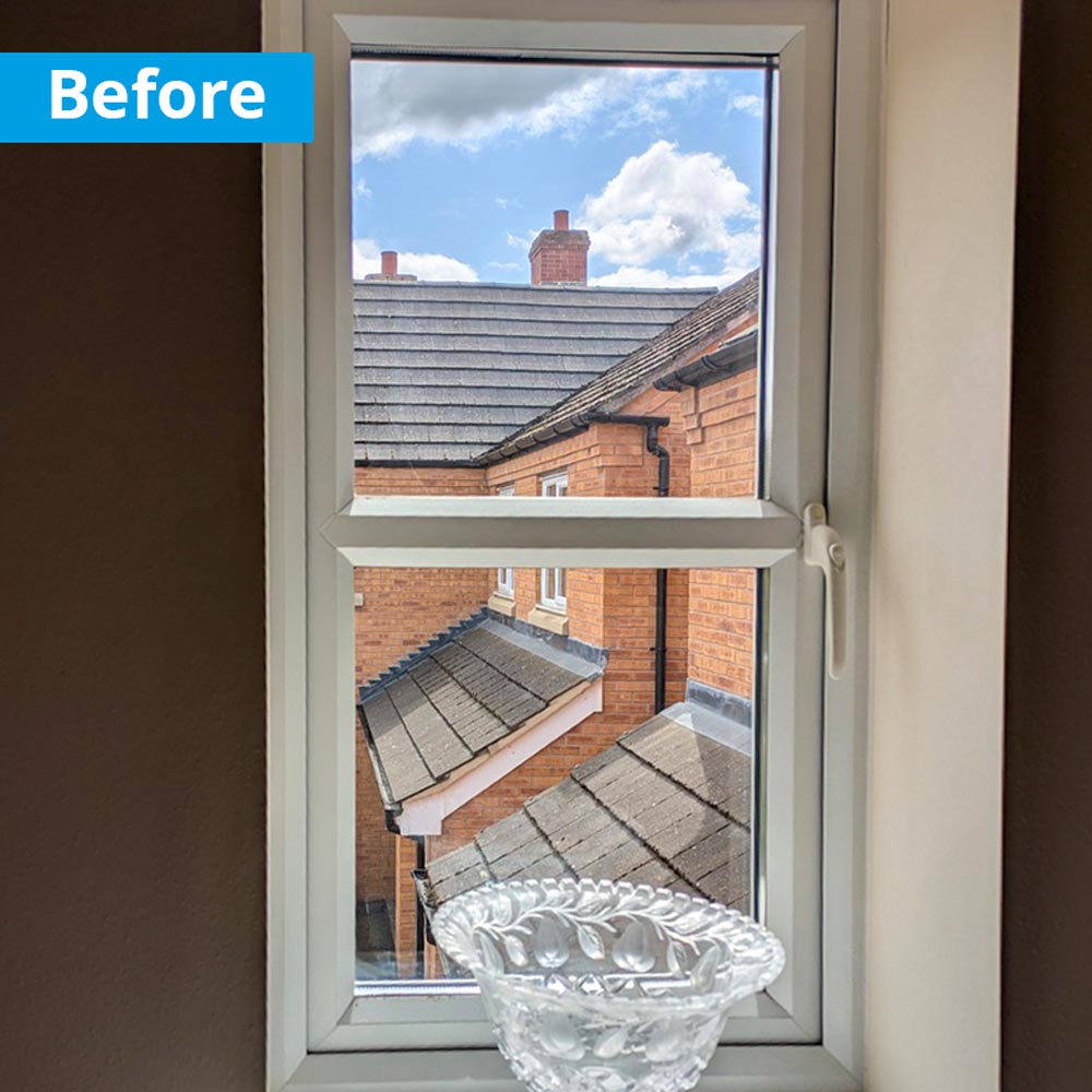 Bedroom side window before installation of opal acrylic air con unit cover.