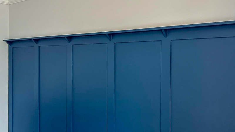 Custom height shaker wall panelling painted in Pinstripe by Valspar