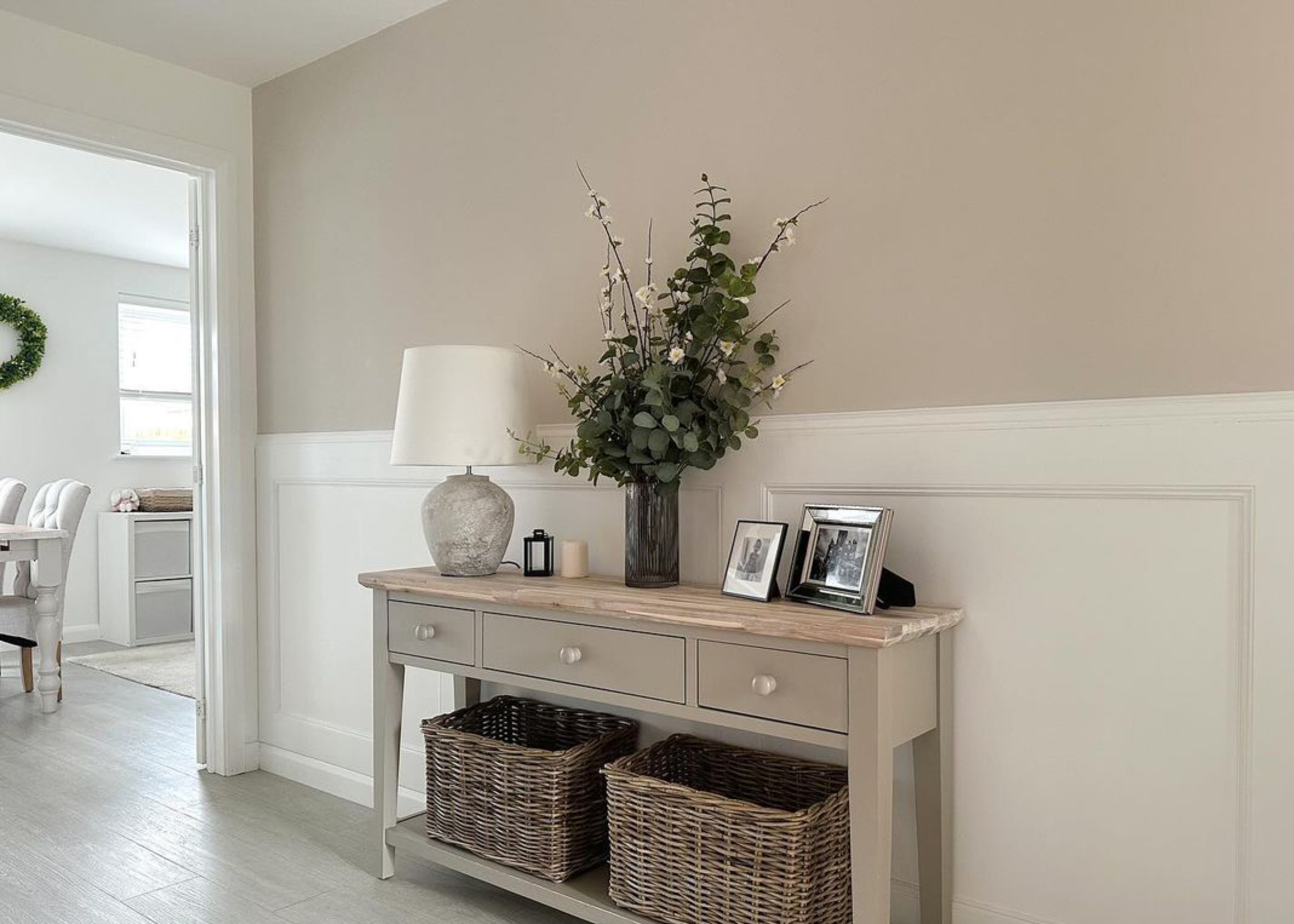 white half height shaker wall panel in hallway